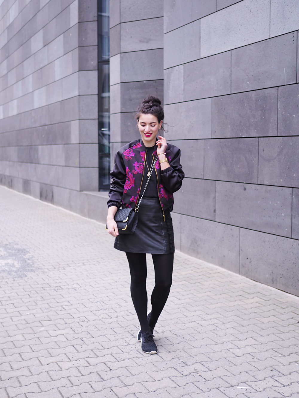 closet embroidered bomber jacket leather skirt mini a line rollneck turtleneck shirt sweater oasis asos chain bag across black tights nike sneakers streetstyle fashion berlin winter spring look
